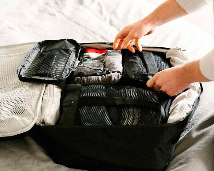 بهترین ترفندهای بستن چمدان با بار زیاد در سفر